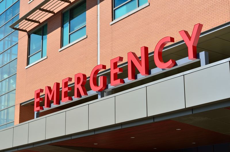 Burn patient recovering in hospital with medical dressings